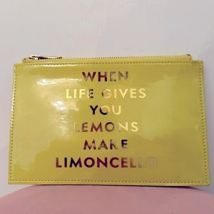 Kate Spade yellow slim clutch